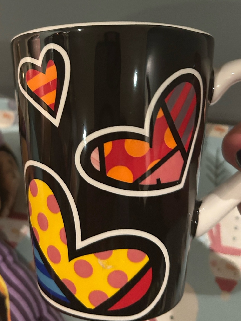Britto Heart Mug with Black background. 12oz.